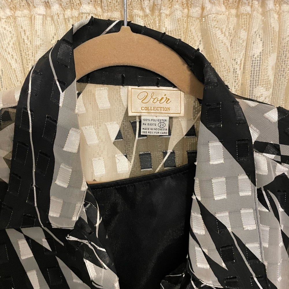 Voir Collection Black and White womans two piece set.